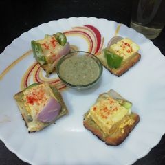 A picture of Paneer Tikka Multigrain Open Bread Sandwich.