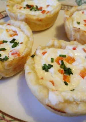 A picture of Goat's cheese and pepper tarts.