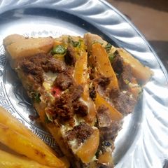 A picture of Title: Egg pizza.