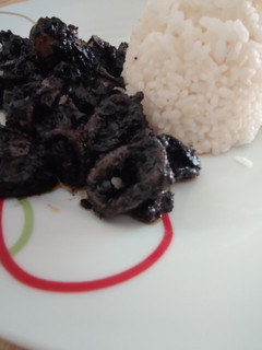Una foto de Calamares en su tinta