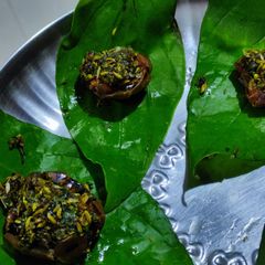 A picture of Dates and betel leaf mukhwas.