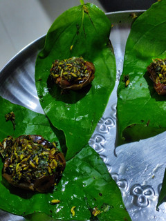 A picture of Dates and betel leaf mukhwas.
