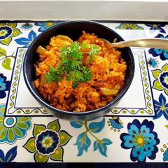 A picture of Spanish Rice with bacon 🍚 or maybe not Spanish but very tasty.