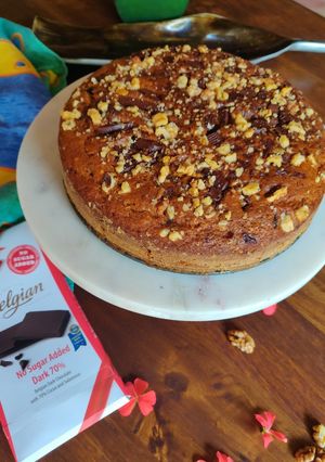 A picture of Pumpkin cake with walnuts and lindt chocolate.