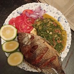 A picture of Fish with traditional veges and kachumbari.