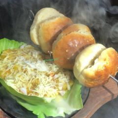 Sizzling cheesy pab bhaj A picture of Sizzling cheesy pab bhaj.