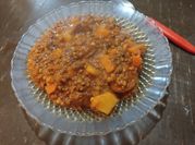 Una foto de guiso de lenteja con chorizo colorado y carne picada