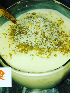 A picture of Mahallabia/ muhallabia arebian creamy desert.