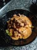 Sartenada de lagarto ibérico en salsa de piquillos