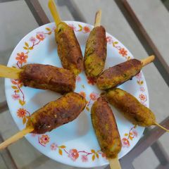 A picture of Bread potato 🍴Stick kabab🍢.