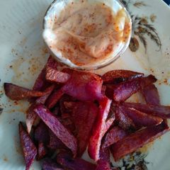 A picture of Purple Sweet potato french fries with spicy dip.