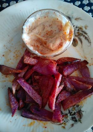 A picture of Purple Sweet potato french fries with spicy dip.