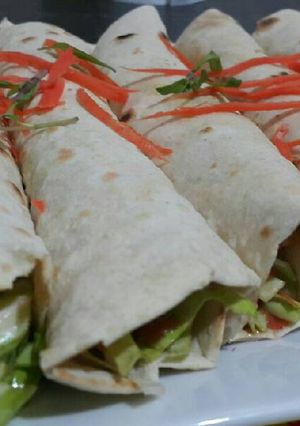 A picture of Chicken Shawarma with Homemade Saj Bread.