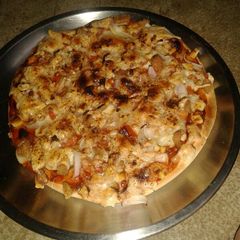 A picture of Shezwan Corn Pizza.