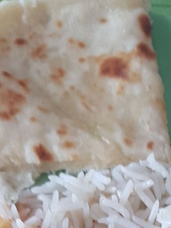 Una foto de Naan de queso