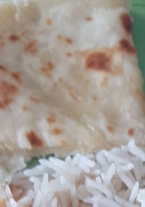 Una foto de Naan de queso