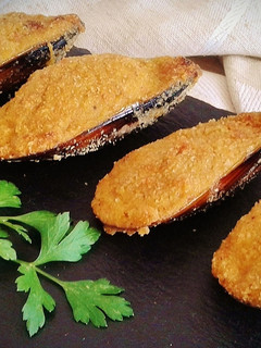 Una foto de Mejillones tigres
