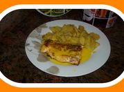 Una foto de salmon a la plancha con naranja