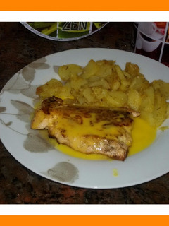 Foto principal de Salmón a la naranja con patatas a las hierbas provenzales