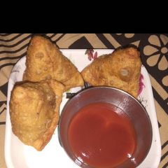 A picture of Wheat flour samosa.