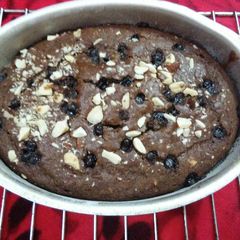 A picture of Whole wheat choco chips jaggery chocolate cake.