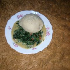 A picture of Ugali with pumkin leaves#,authormarathon.