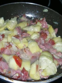 Una foto de Alcachofas en conserva con jamón serrano