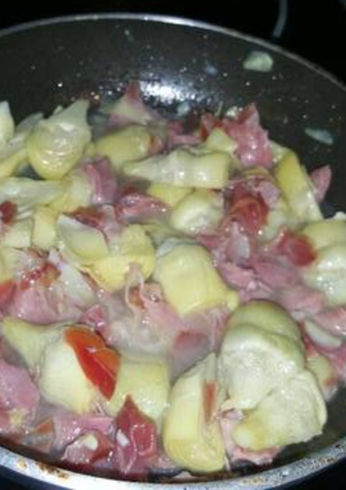 Una foto de Alcachofas en conserva con jamón serrano