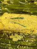 Hilsa paturi (fish steamed in banana leaf)