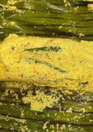 A picture of Hilsa paturi (fish steamed in banana leaf).