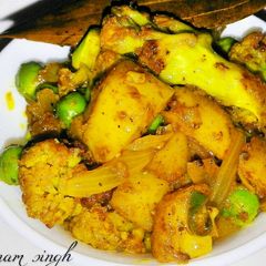 A picture of Aloo gobhi matar.