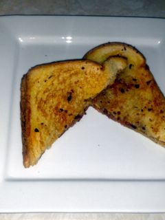 A picture of Grilled bacon cheese sandwich.