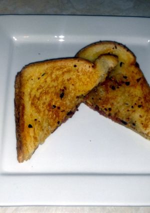 A picture of Grilled bacon cheese sandwich.