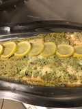 Filet de saumon sauvage en papillote au fumet de homard échalotes persil crème et citron