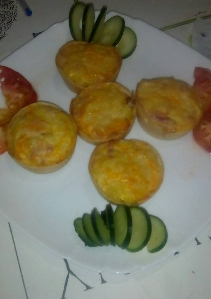 Una foto de Pastelitos de tortilla de patata beicon jamon york y queso