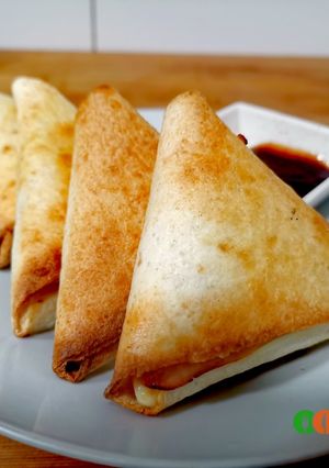 Una foto de Triángulos rellenos de lo que quieras