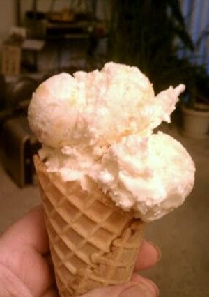 A picture of easy,no churn ice cream,peach flavor.