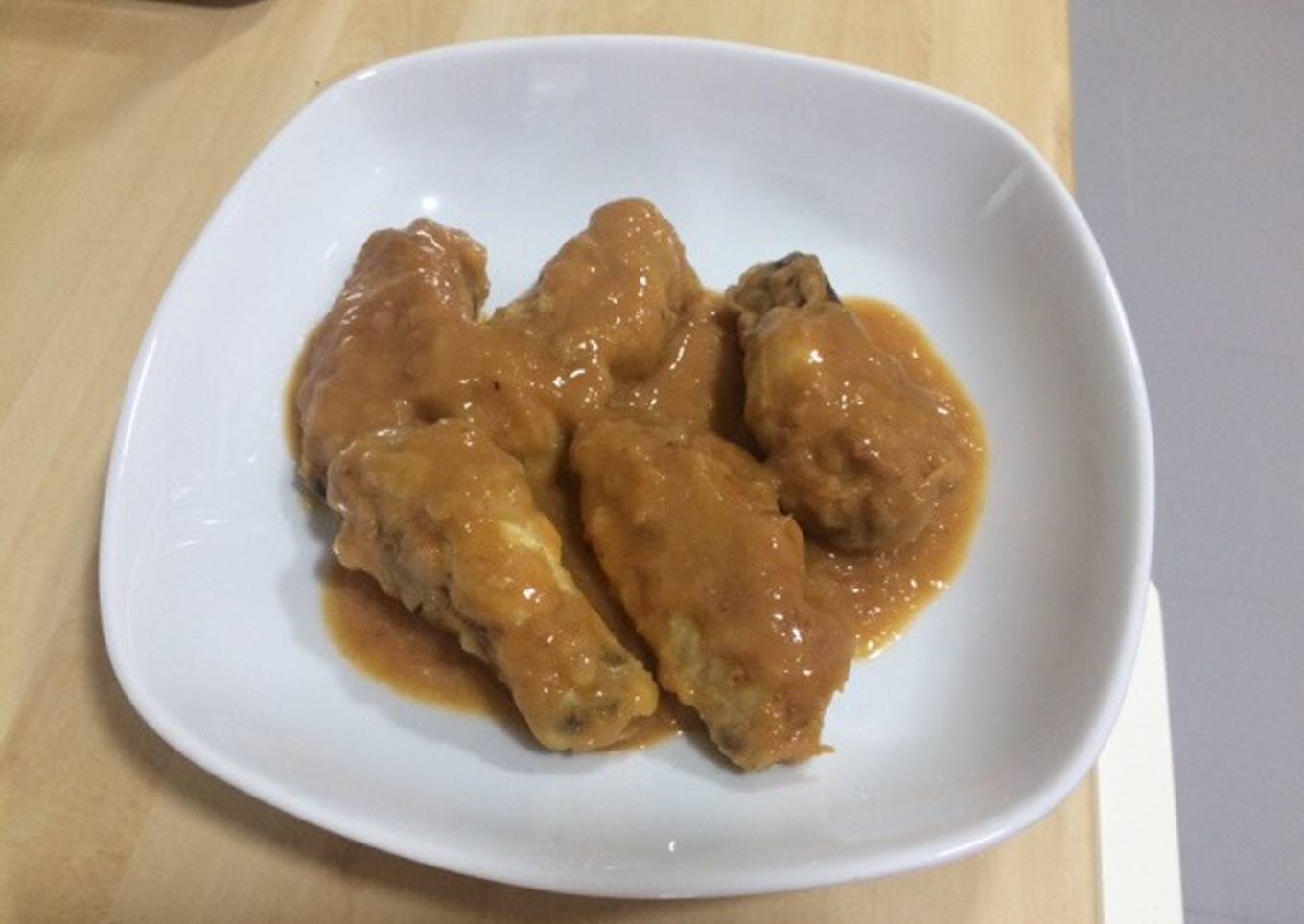 Alitas de pollo en salsa