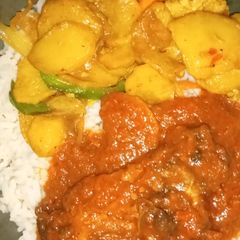 A picture of Sultan chips With Rice and stew.