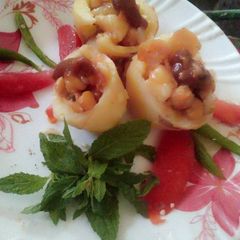 A picture of Chanachat in potato cups.