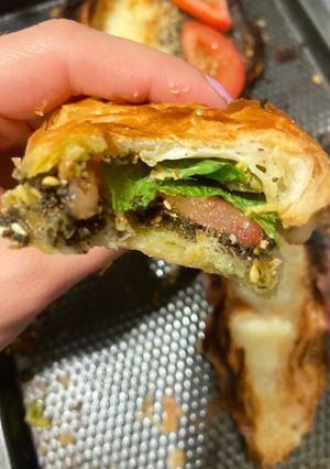 A picture of Zaatar and cheese croissant.
