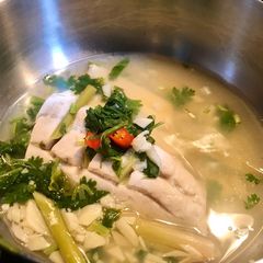 A picture of Steamed fish in chilli, lime and garlic broth.
