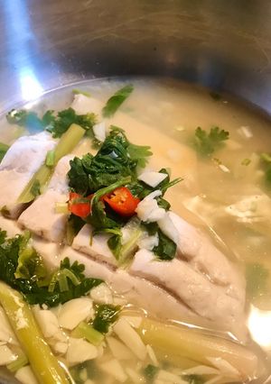 A picture of Steamed fish in chilli, lime and garlic broth.