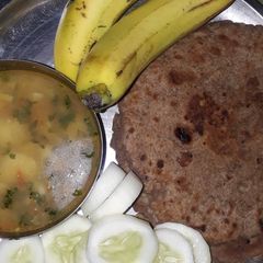 A picture of Flahari Poori/paratha with aloo sbzi.