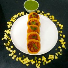 A picture of Ripe mango cutlet with raw mango chutney.
