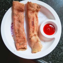 A picture of Raw mango aloo instant dosa.