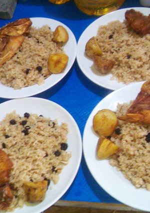 Una foto de Arroz de Cocó en Coca-Cola papá acompañado con mojarra