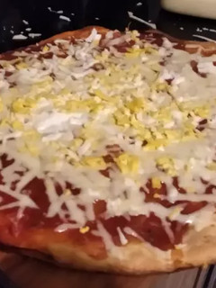 Una foto de Pizza cuarentona