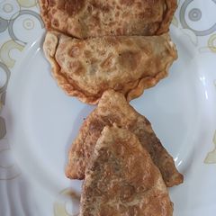 A picture of Chocolate samosa and gujiya.