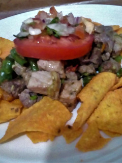 Una foto de Nachos con Carne